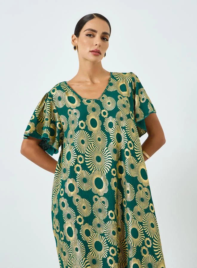 تايك تو جلابية بطبعة جرافيك وأكمام قصيرة